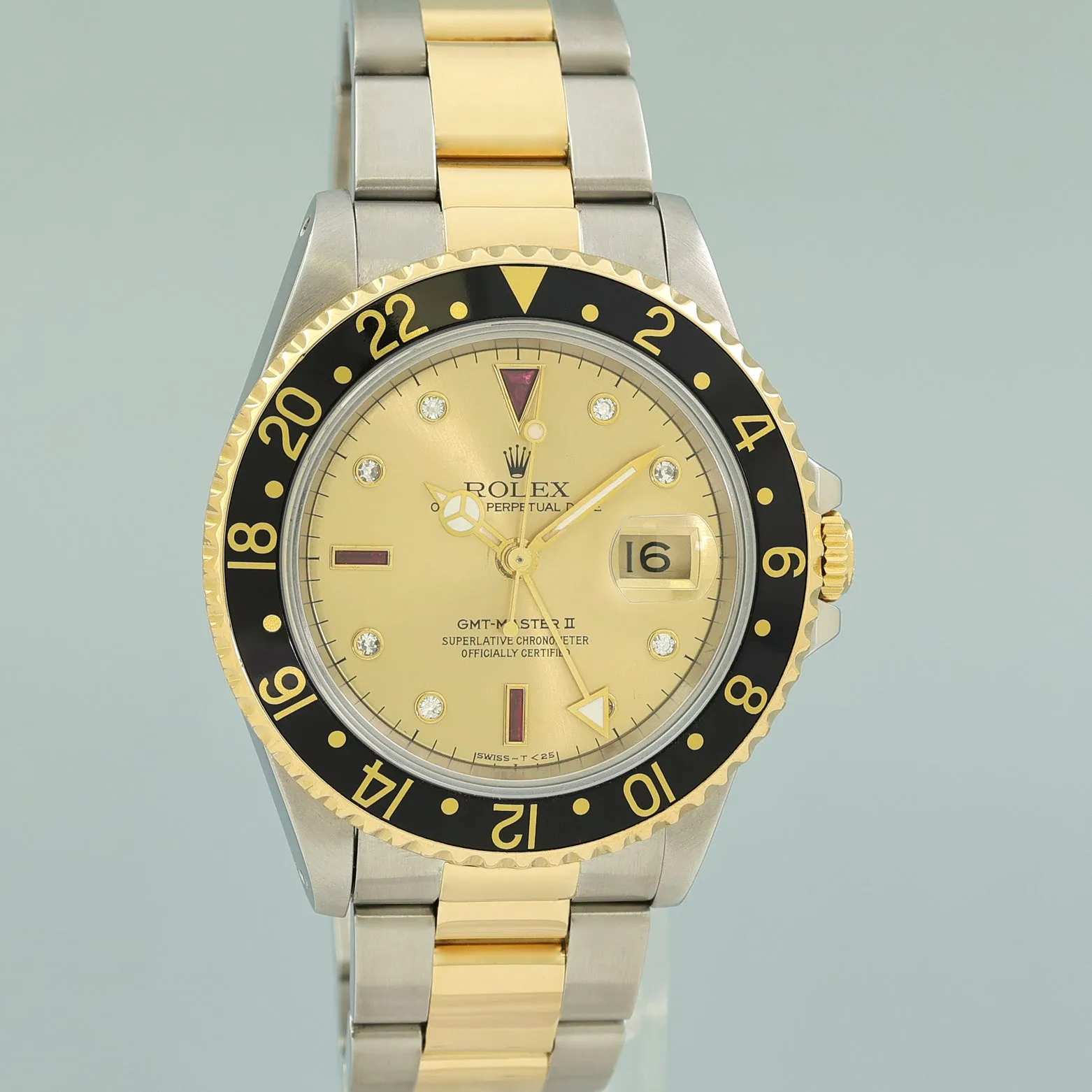 Rolex GMT-Master 2 16713 Two-Tone Yellow Gold Champagne Serti Ruby Diamond Watch
